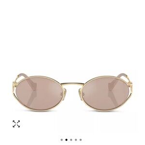 Gold Oval Sunglasses with Thin Metal Frame and Light Pink Lenses